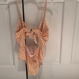 Yellow and white bathing suit